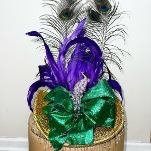 “Decatur”
Gold Cowboy hat with Purple & Peacock Feathers